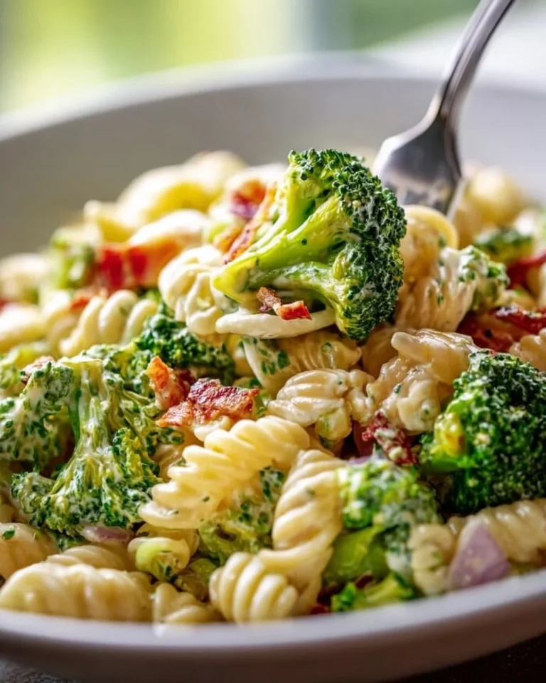 Delicious broccoli pasta salad with colorful vegetables and dressing