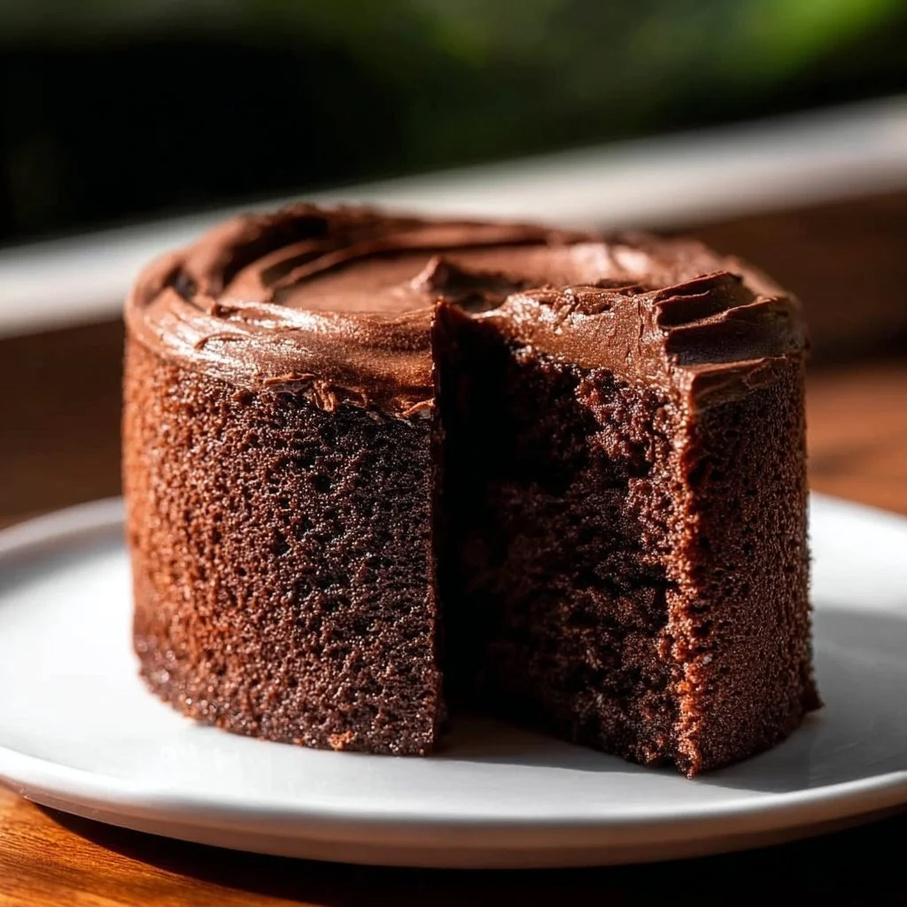 Slice of rich chocolate cake representing chocolate heaven.